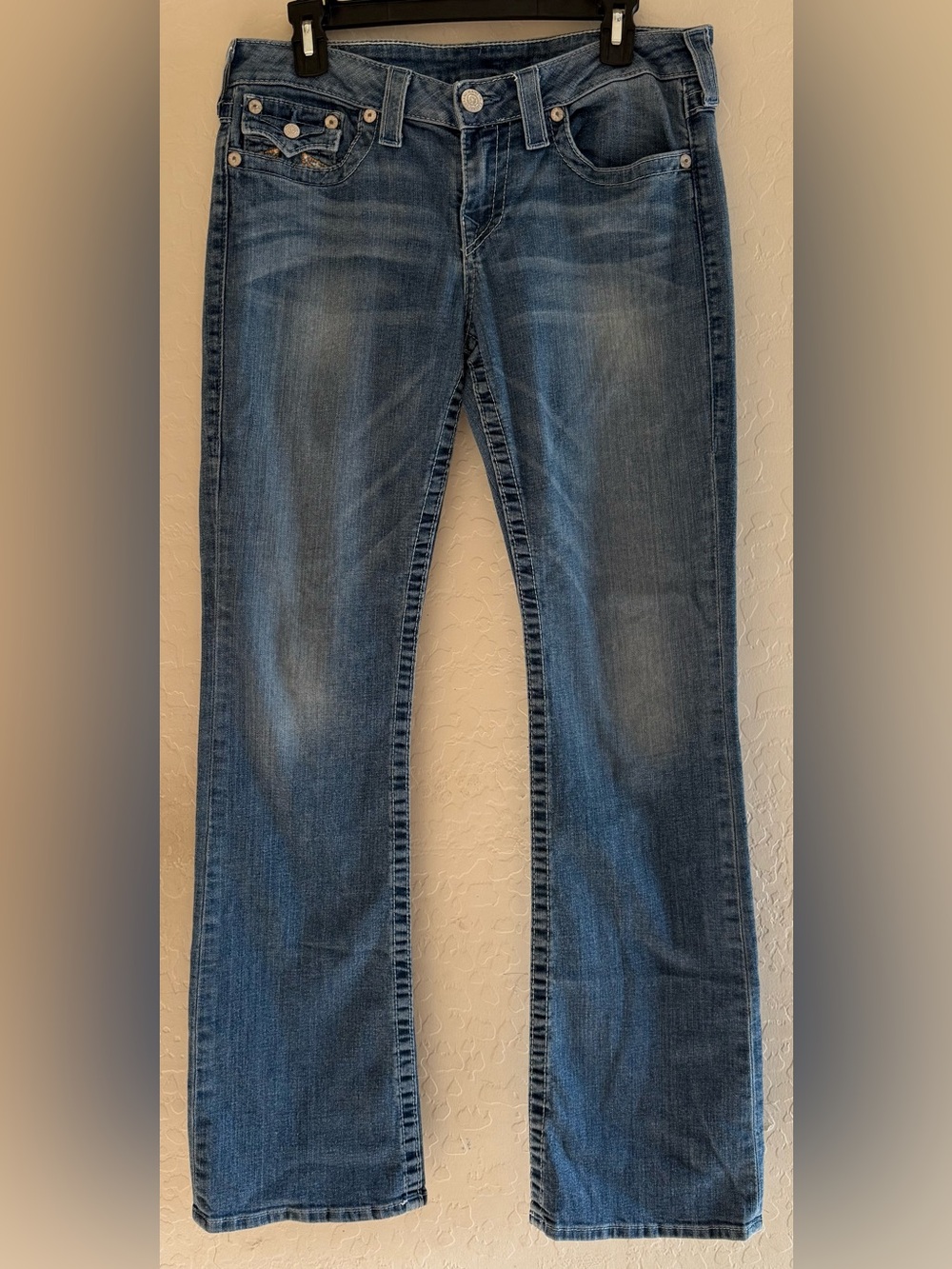 True Religion, size 31, boot leg jeans with embroidered flap pockets